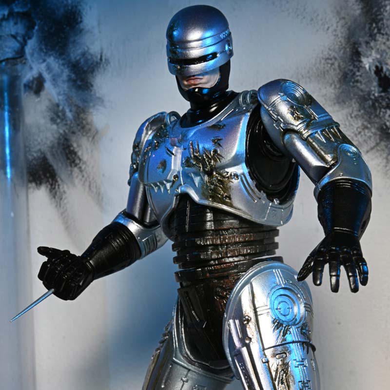 Figura Ultimate Battle Damaged RoboCop with chair RoboCop Neca 05
